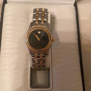 Woman’s movado two tone watch